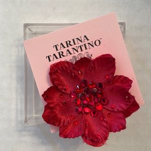 Tarina Tarantino red hair flower